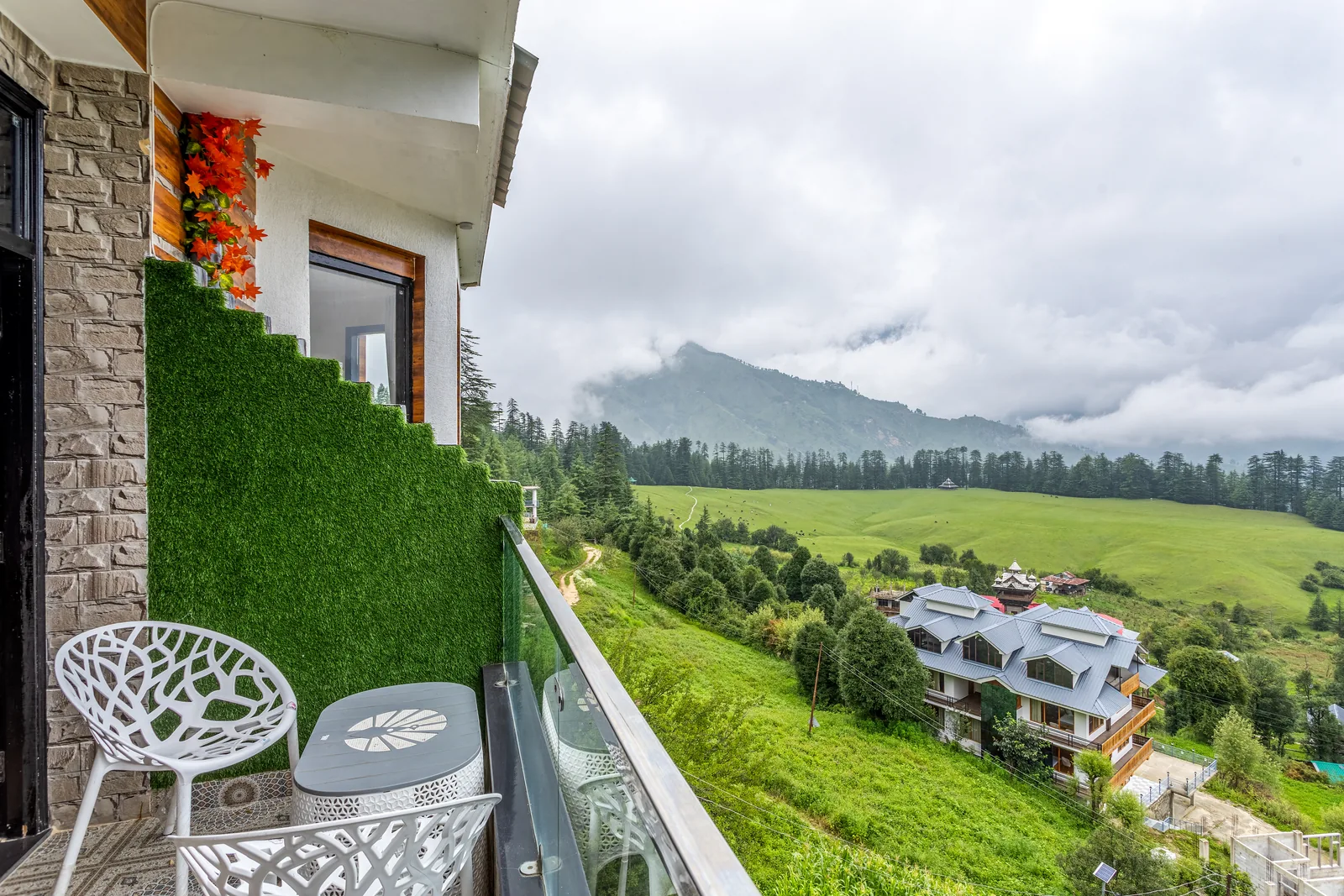 Meadow Suite — the private balcony, meadow below