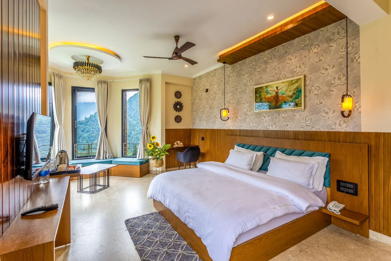 Pavilion Suite — king bed alongside the bay windows