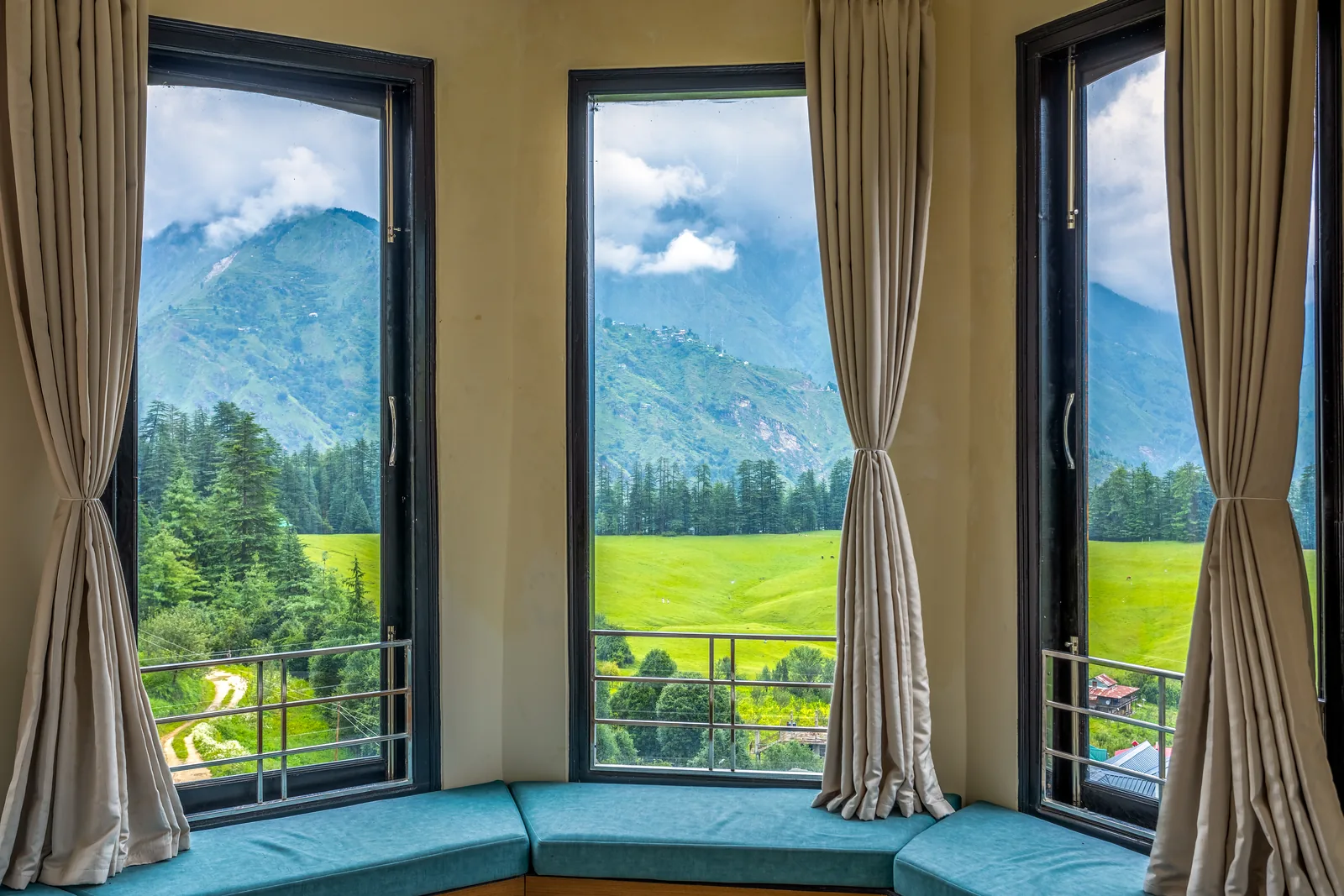 Pavilion Suite — window seat looking onto the meadow and mountains