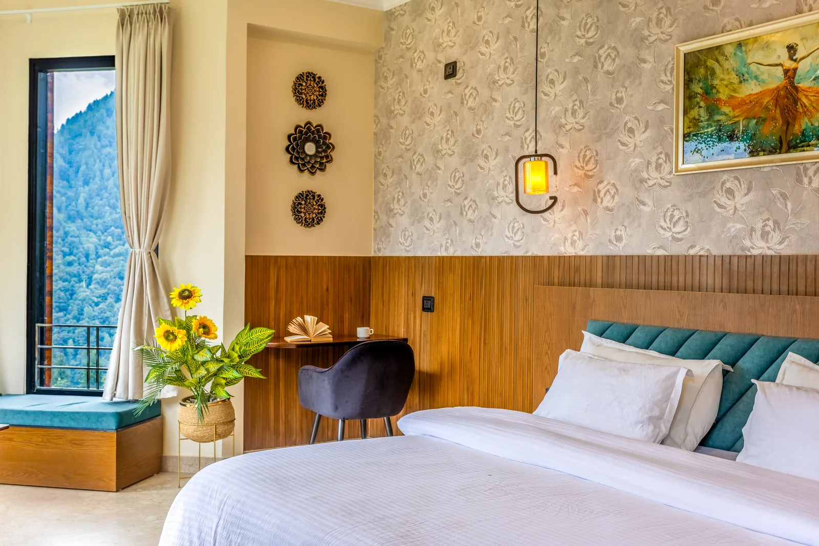 Pavilion Suite — bed, armchair and window